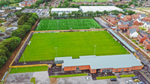 Wimborne Town FC New Cuthbury with natural turf stadia pitch and 3G training pitch